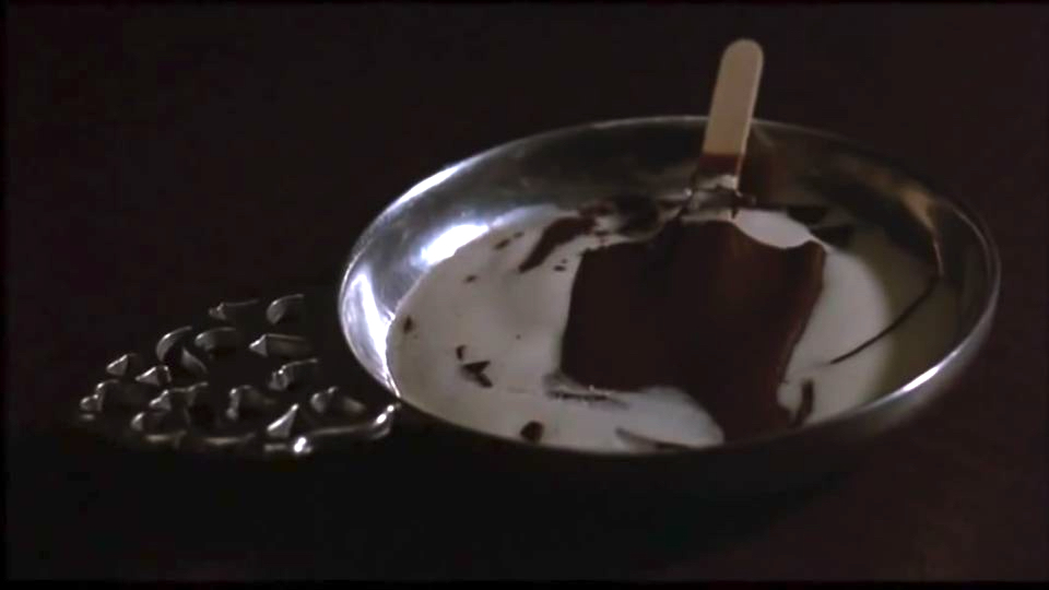 (Picture 1: A melted ice cream signifies the loss of youth and innocence, becoming a sign of a dirt and transitory life. Picture © Melvin Simon Productions &amp; Sony Pictures Home Entertainment.)